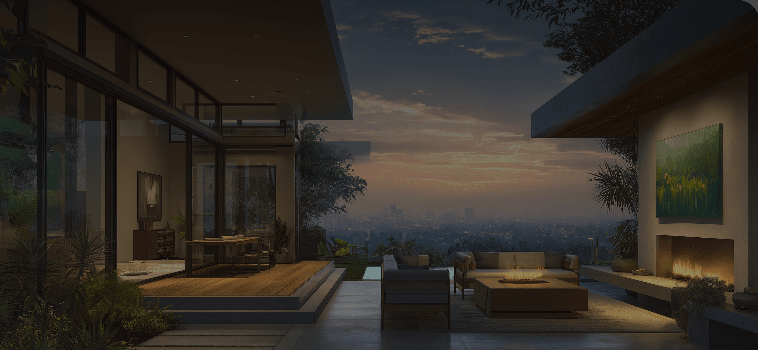 Contemporary hillside residence overlooking a city at sunset